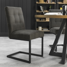 Pair of Indus Upholstered Cantilever Dining Chairs (Dark Grey Faux Leather) by Bentley Designs
