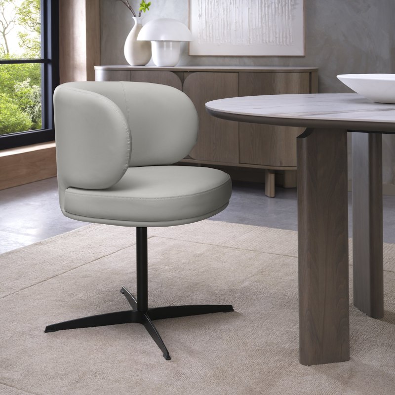 Marcel 360 Degree Swivel Dining Chairs - Light Grey Faux Leather (Pair) by Bentley Designs Marcel 360 Degree Swivel Dining Chairs - Light Grey Faux Leather (Pair) by Bentley Designs